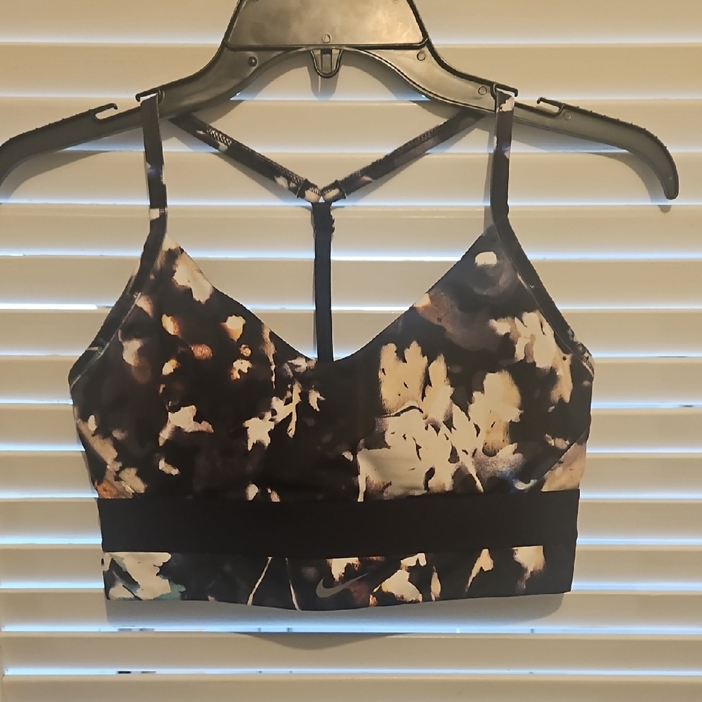 Nike Black and White Sports Bra with Strappy Design and Low-Cut Neckline